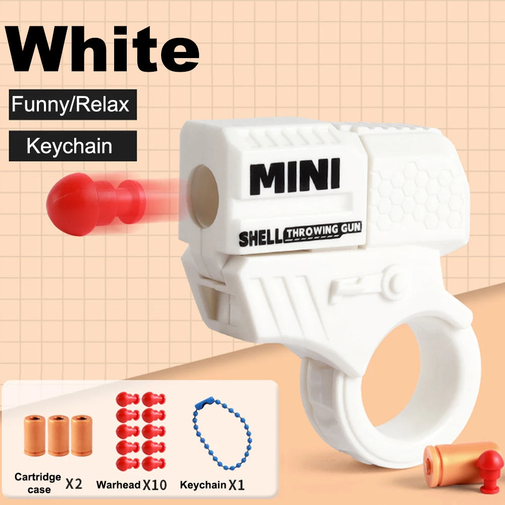 Mini Pistol Stress Relief Toys Keychain Decompression Launcher Model Keyring for Woman Men Handbag Accessories Gift