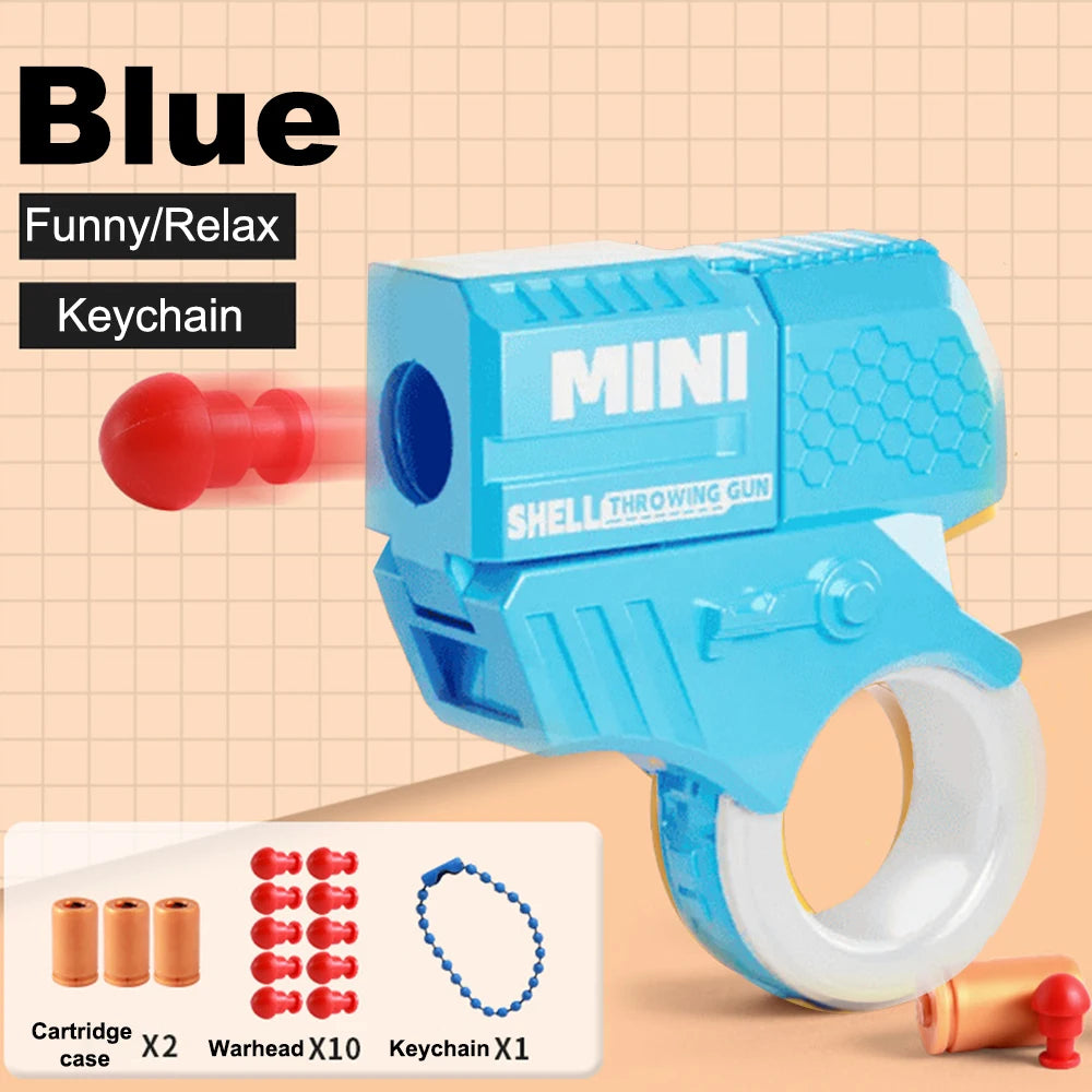 Mini Pistol Stress Relief Toys Keychain Decompression Launcher Model Keyring for Woman Men Handbag Accessories Gift