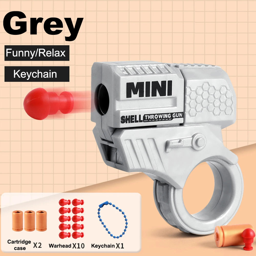 Mini Pistol Stress Relief Toys Keychain Decompression Launcher Model Keyring for Woman Men Handbag Accessories Gift